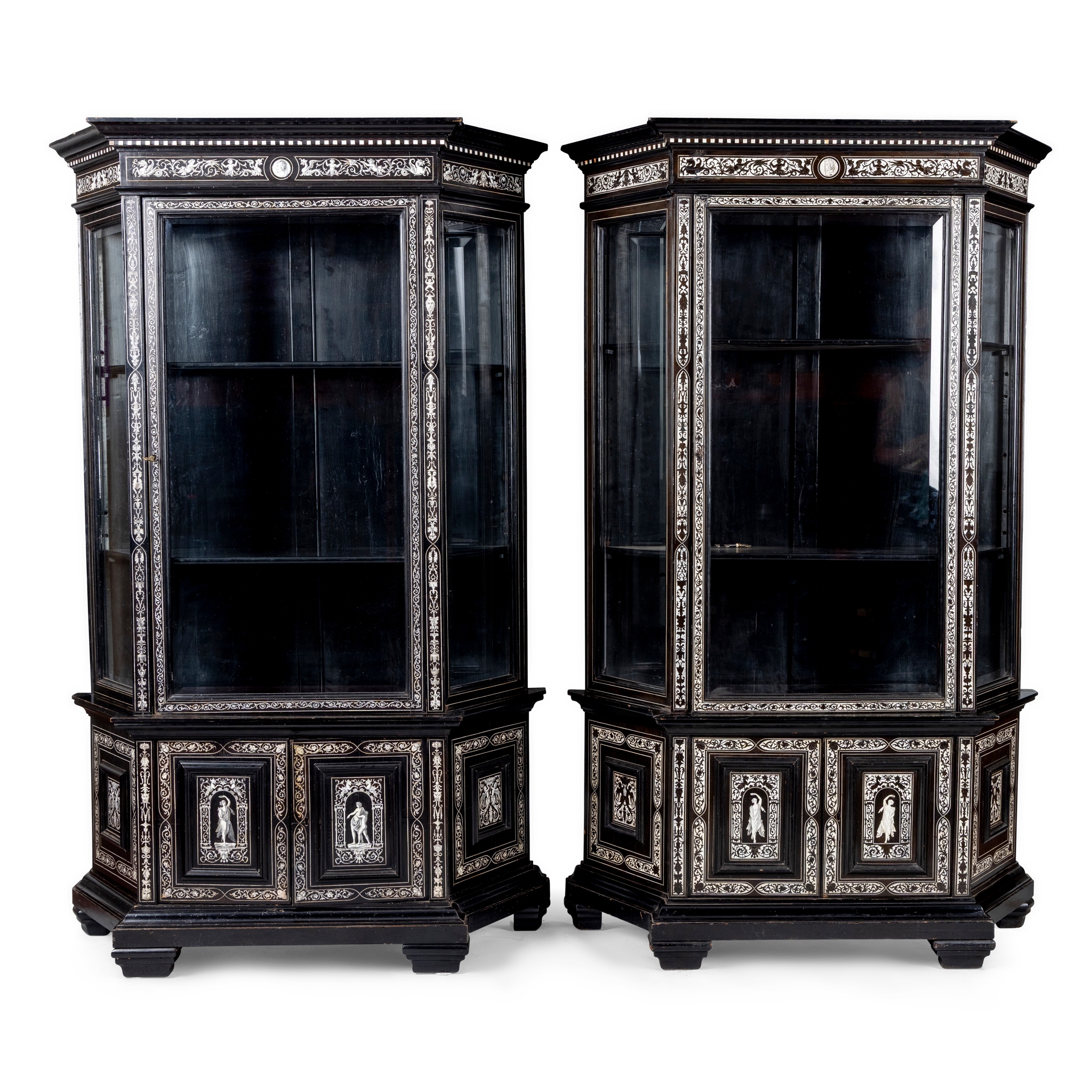 A PAIR OF ITALIAN EBONY, EBONISED AND BONE-INLAID DISPLAY CABINETS