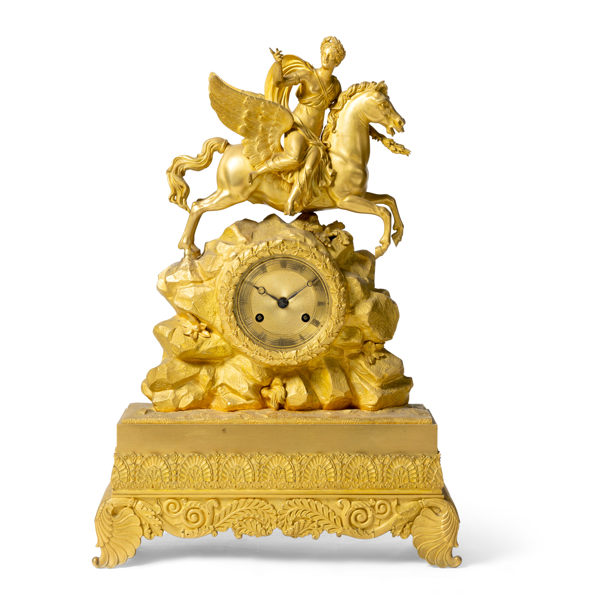 A FRENCH GILT METAL MANTEL CLOCK