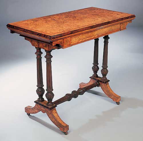 A Victorian burr walnut foldover games table
