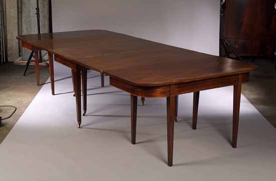 A George III mahogany D end dining table