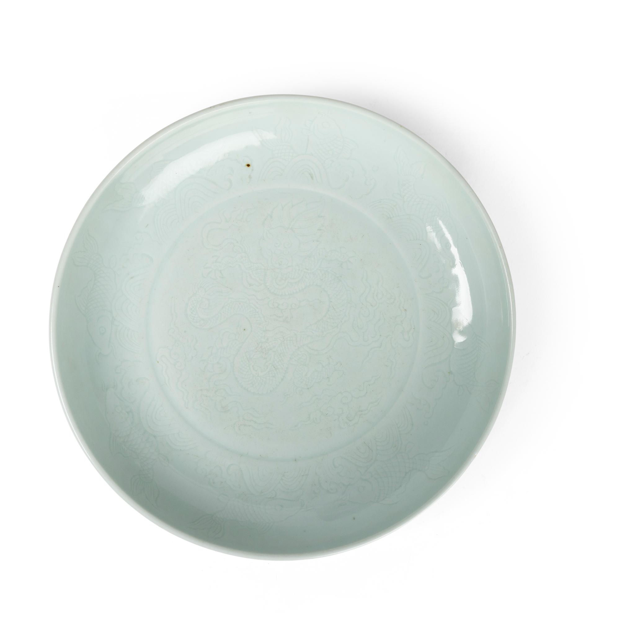 CHINESE TIANBAI-GLAZED INCISED 'DRAGON AND FISH' PLATE