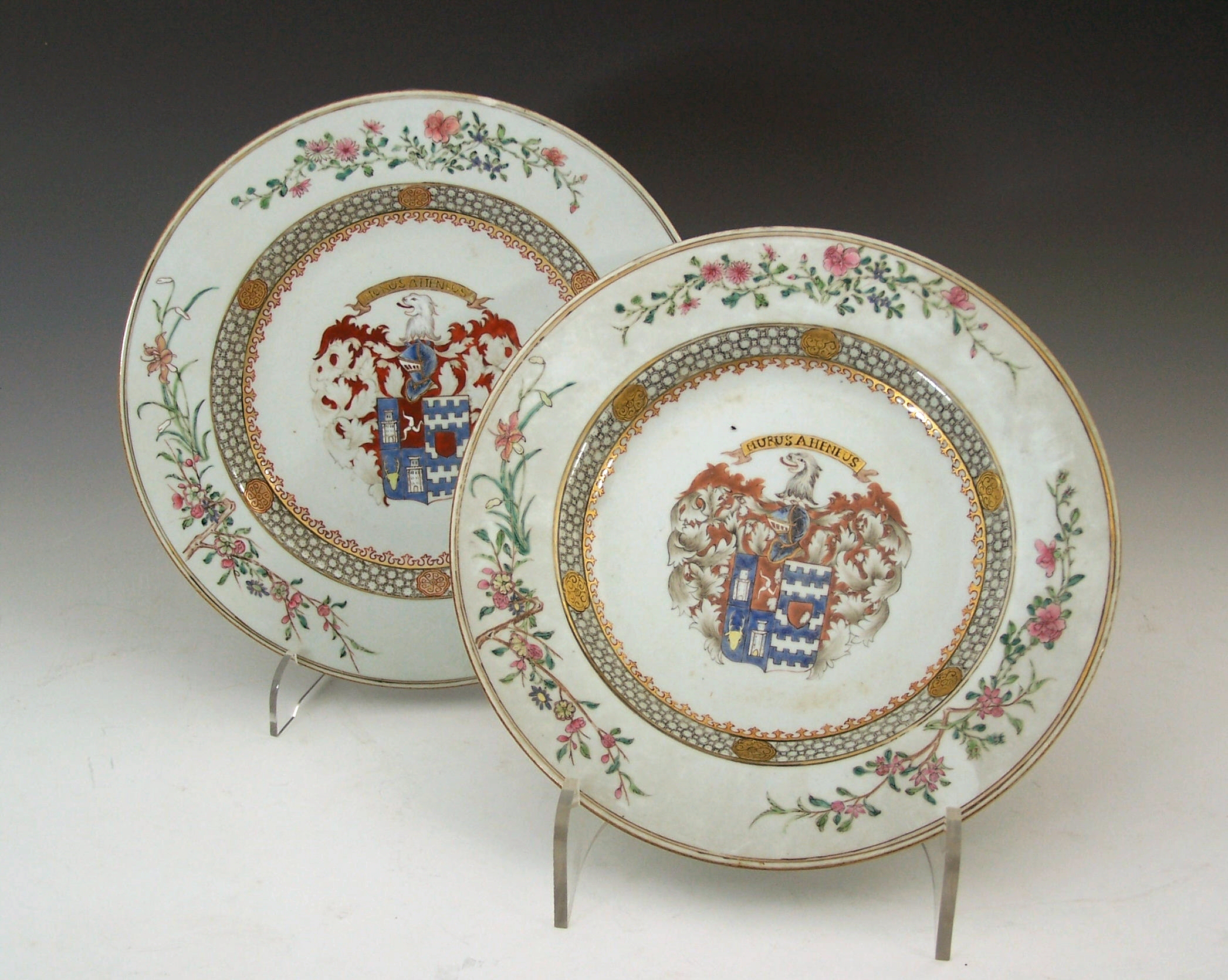 A set of fourteen Chinese export Armorial plates, circa 1733,