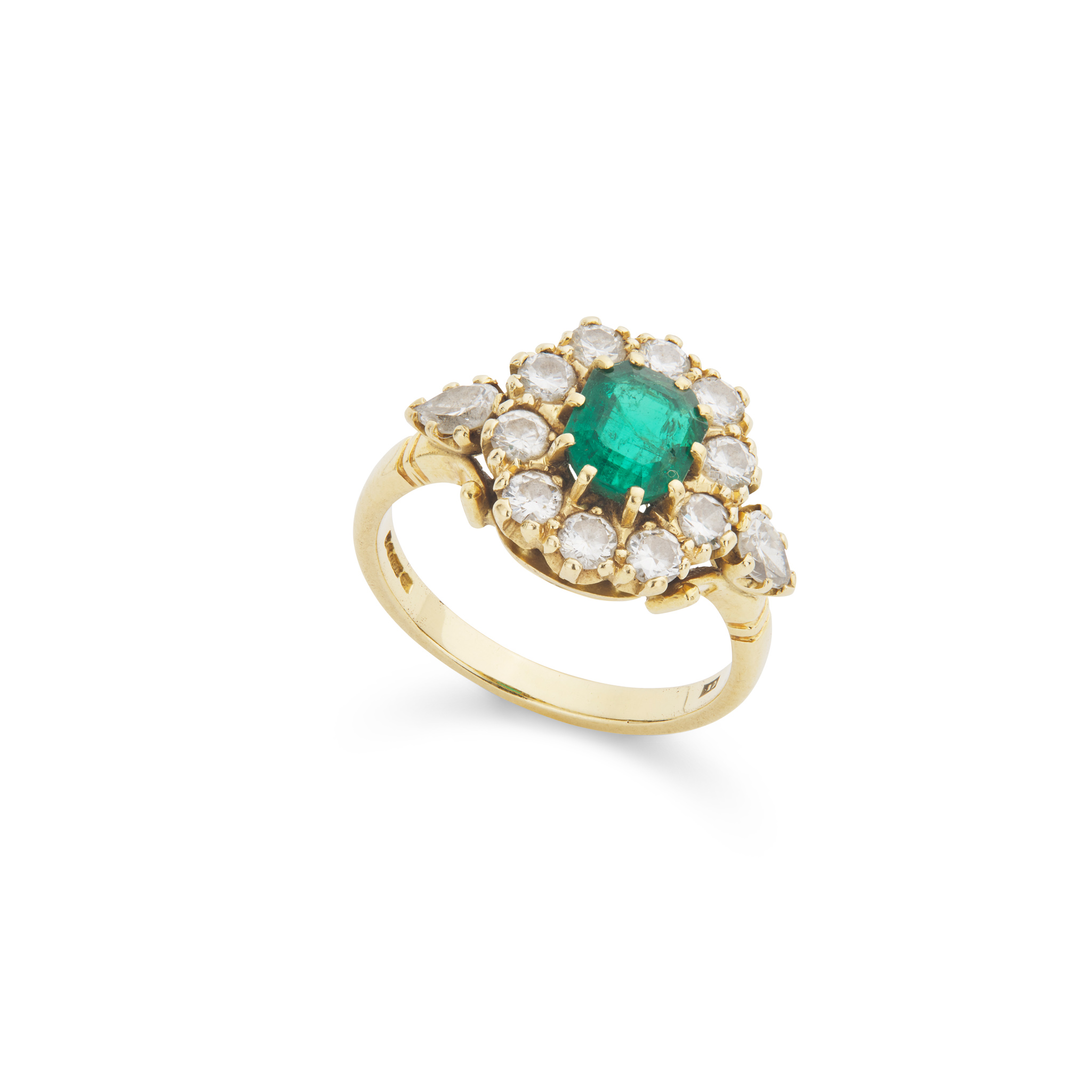 An emerald and diamond cluster ring
