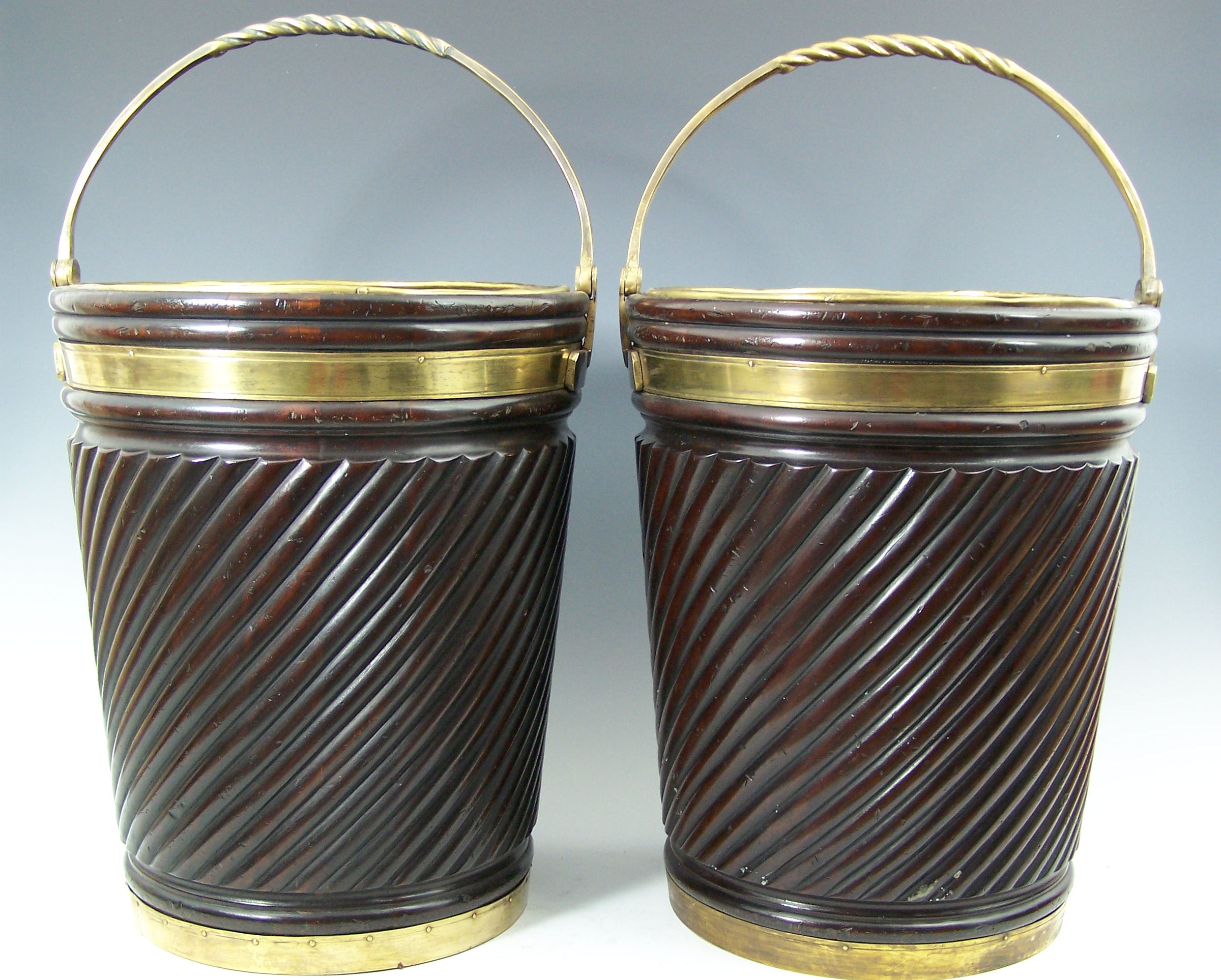 A pair of mahogany peat buckets,