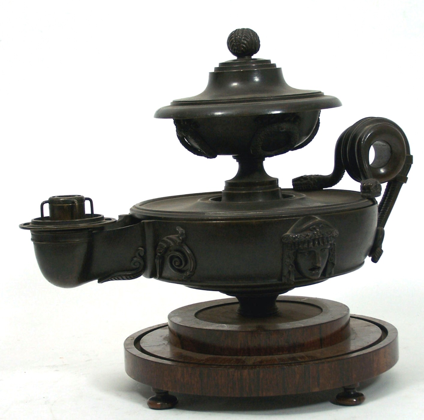 A Regency period patinated bronze colza lamp In the manner of Thomas Hope