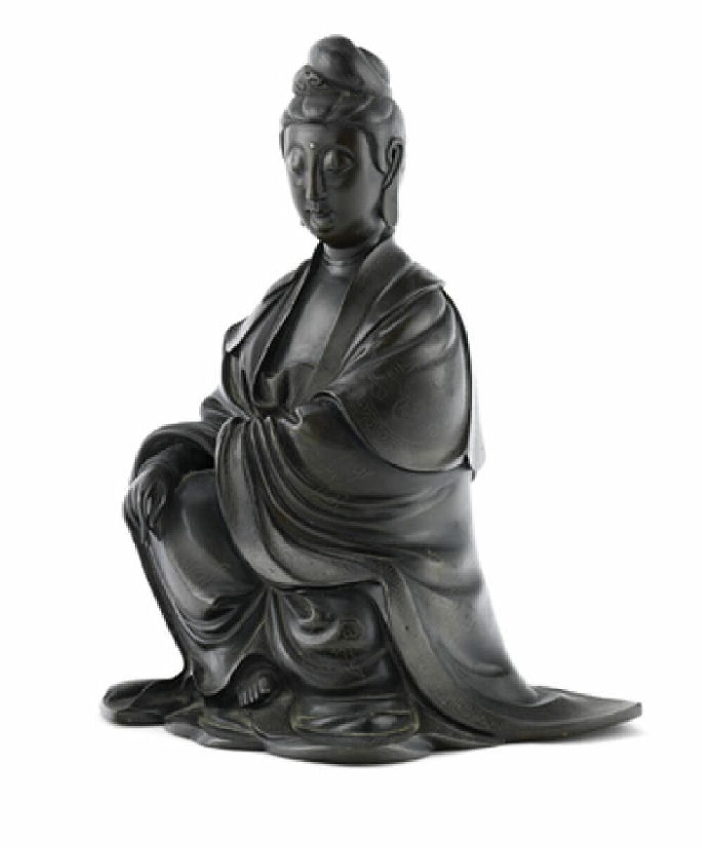 A Chinese silver inlaid bronze figure of Guanyin