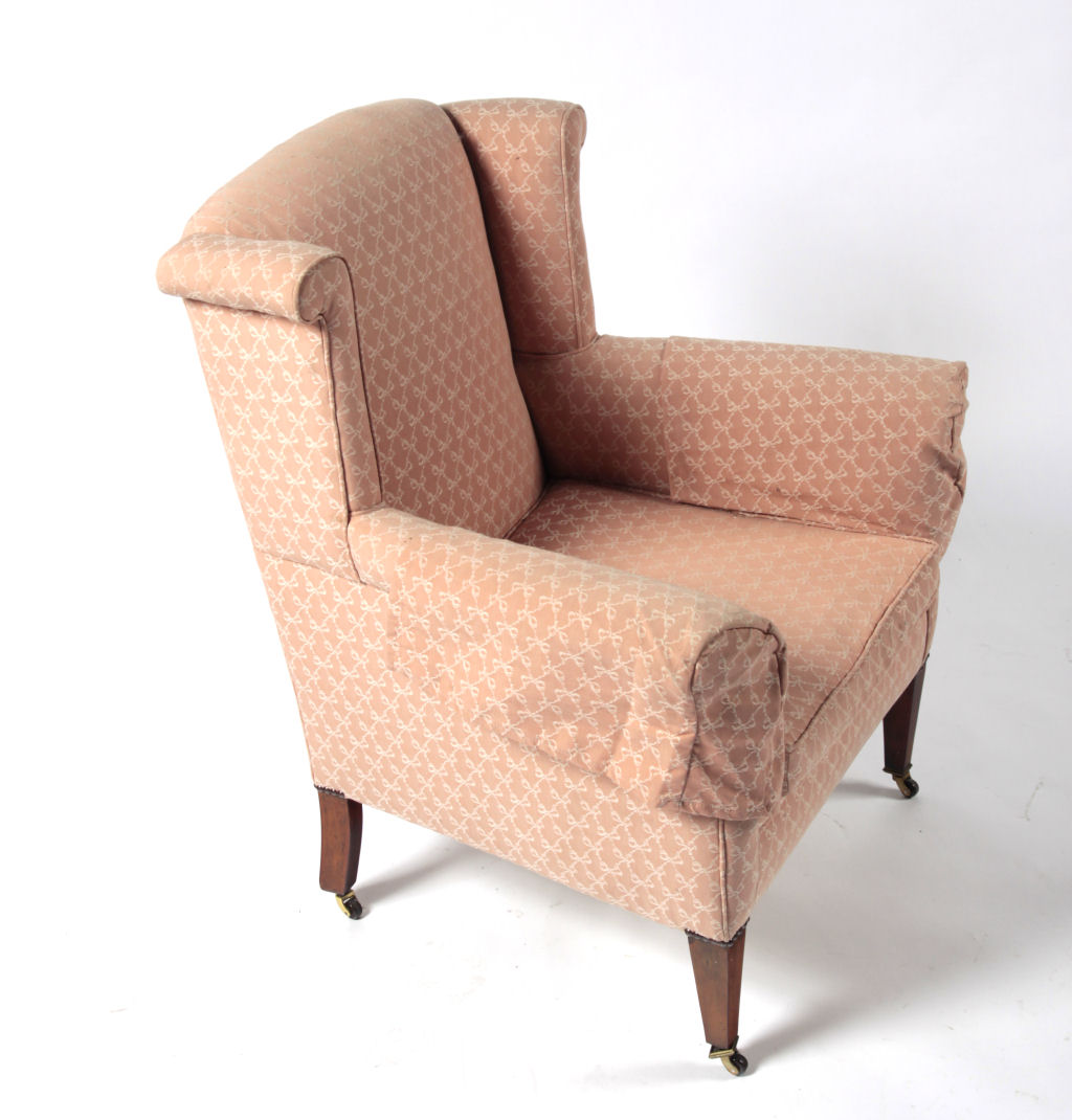 A late Victorian pink upholstered armchair
