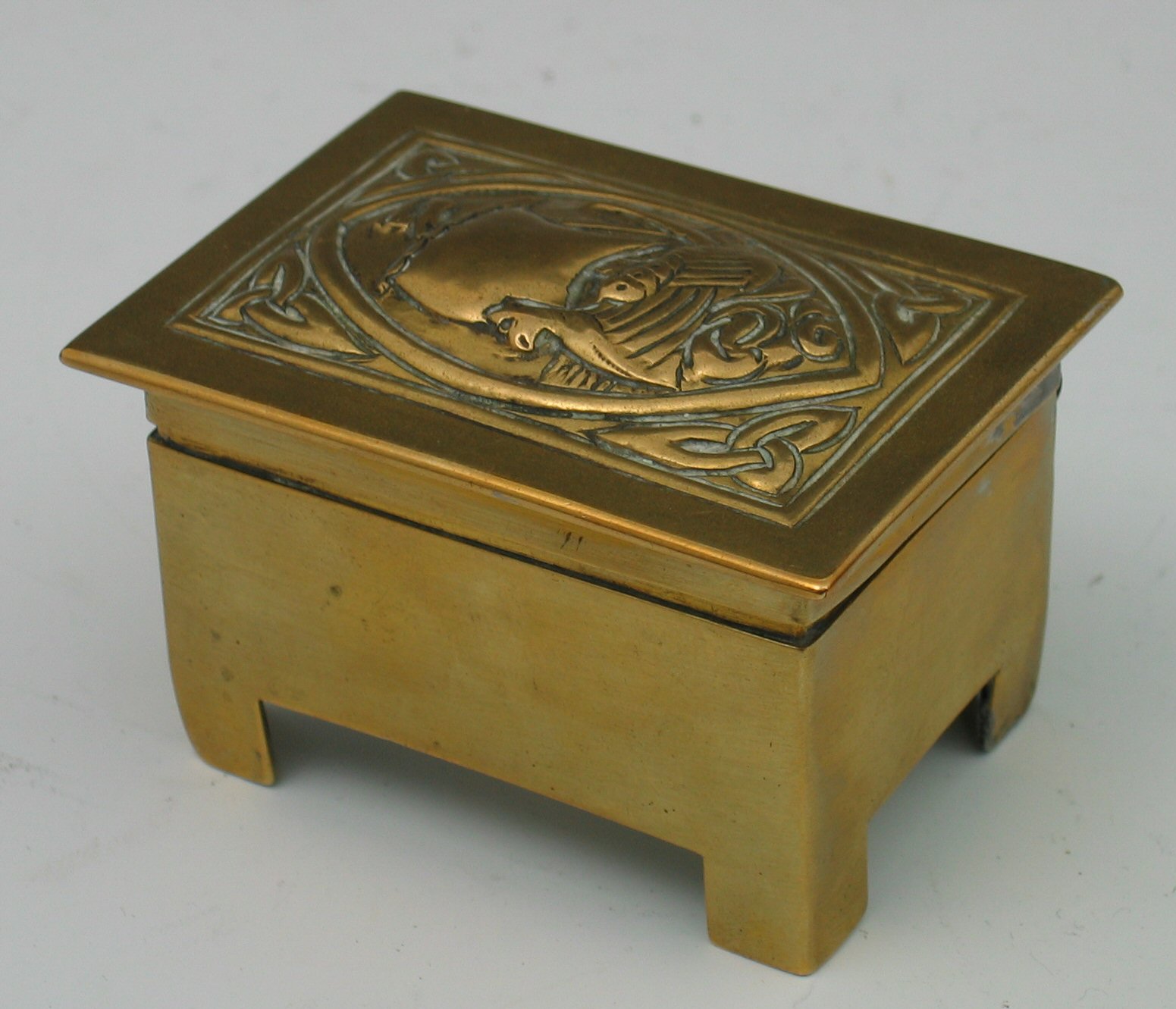 An Alexander Ritchie brass trinket box,
