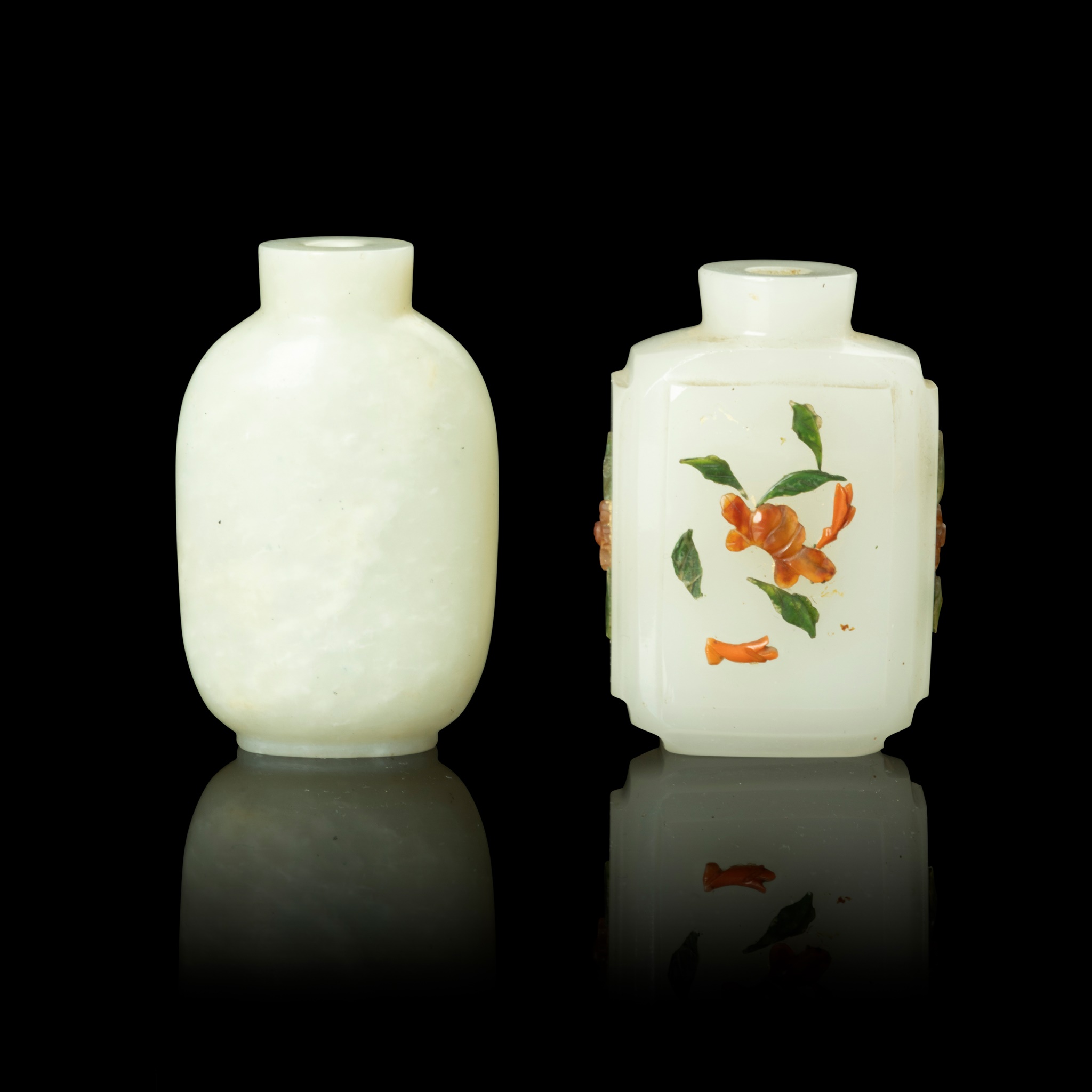 TWO PALE CELADON JADE SNUFF BOTTLES