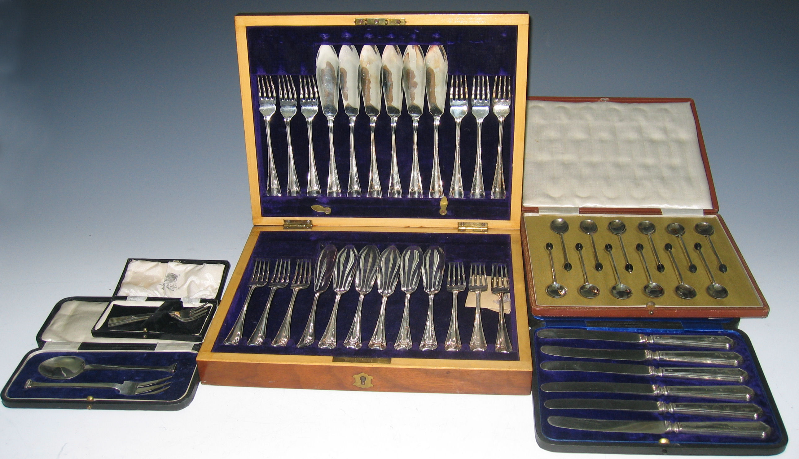 A set of twelve pairs of fish knives and forks,