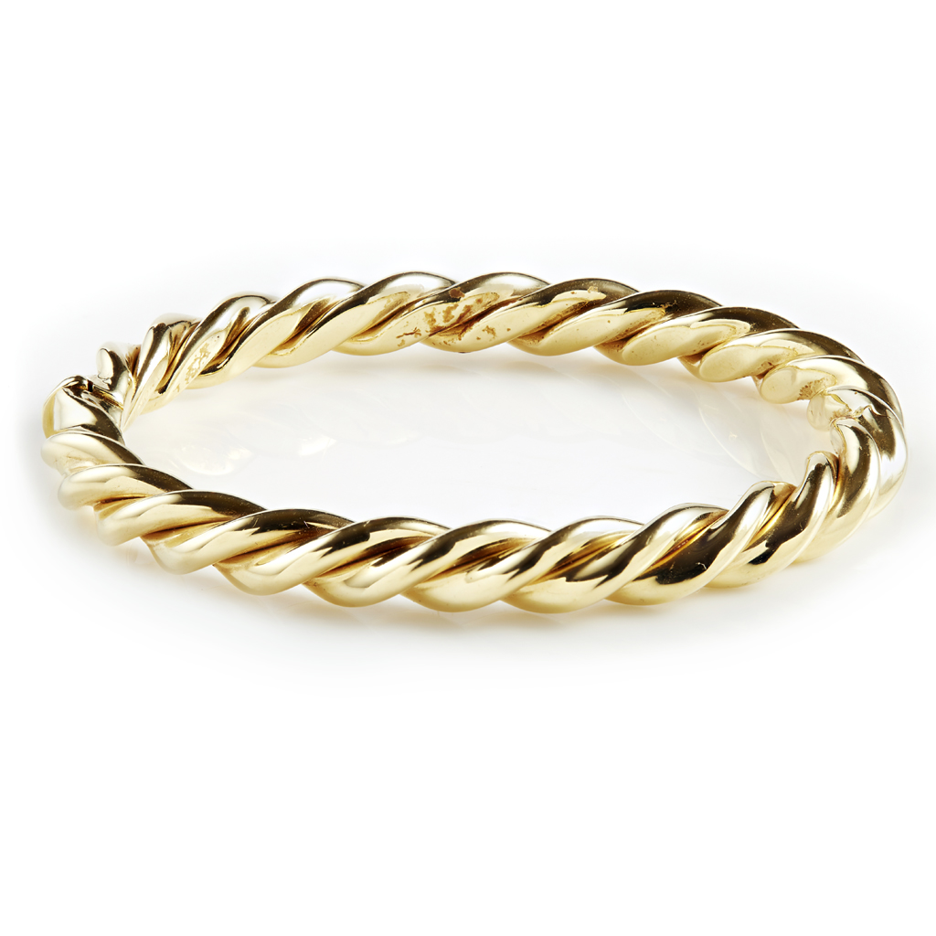 A modern 18ct gold bangle