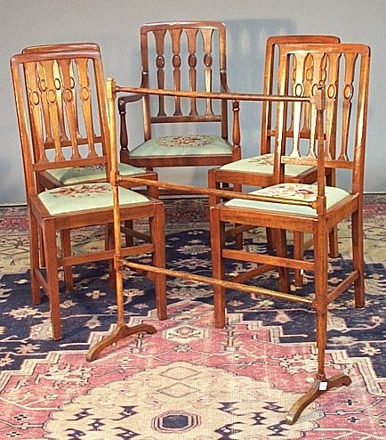 A set of five mahogany dining chairs