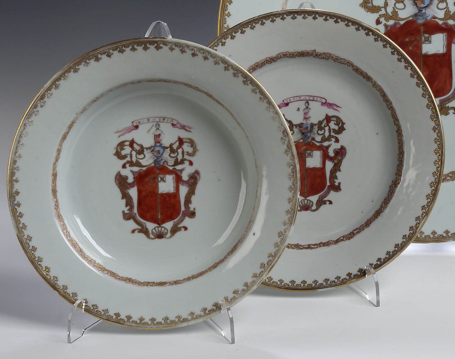 A Chinese 18th century export armorial part dinner service