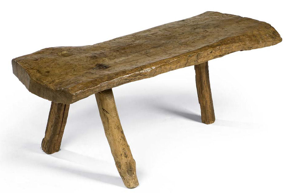 A large George IV primitive oak pig sticking bench, circa 1820