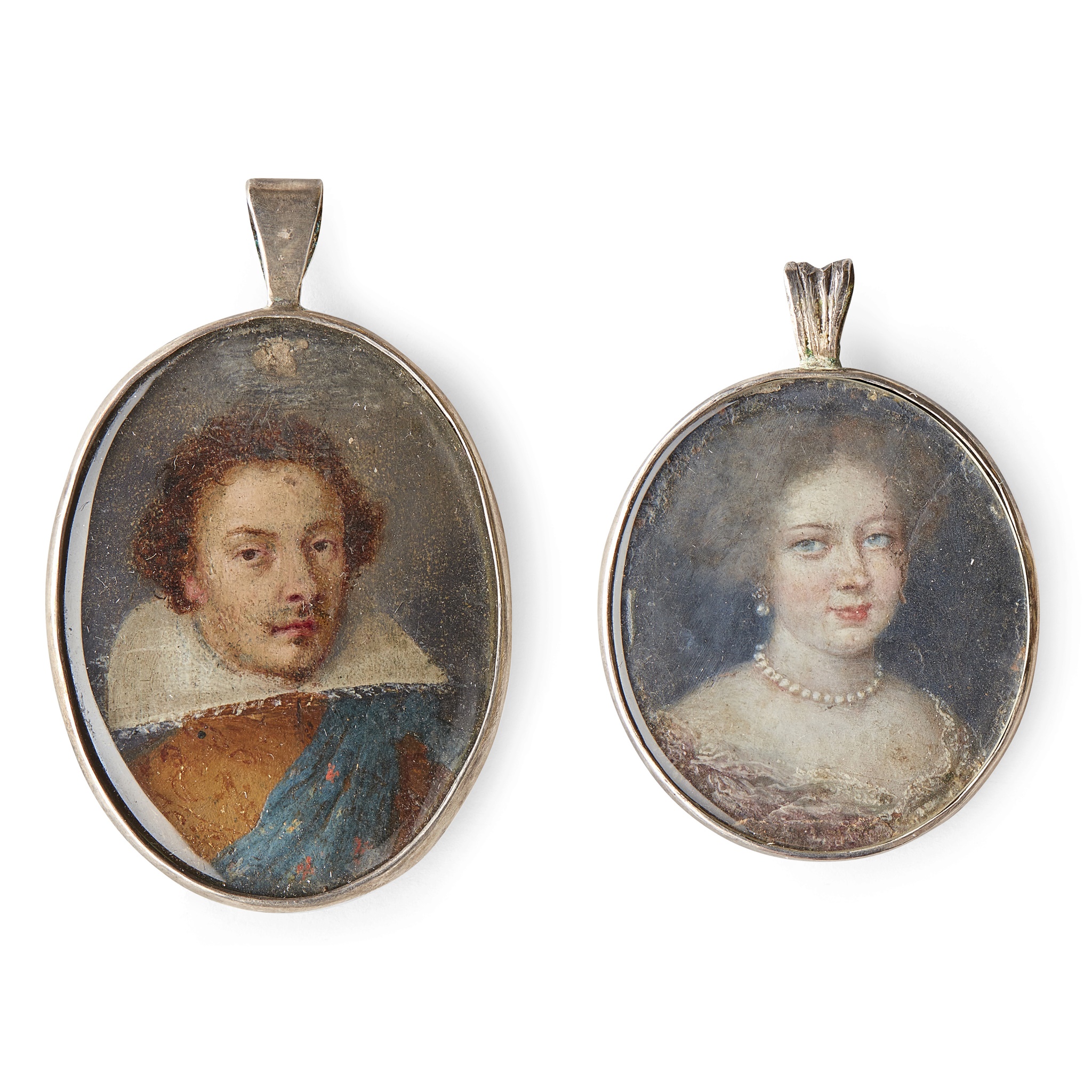 TWO PORTRAIT MINIATURES OF A GENTLEMAN AND A LADY