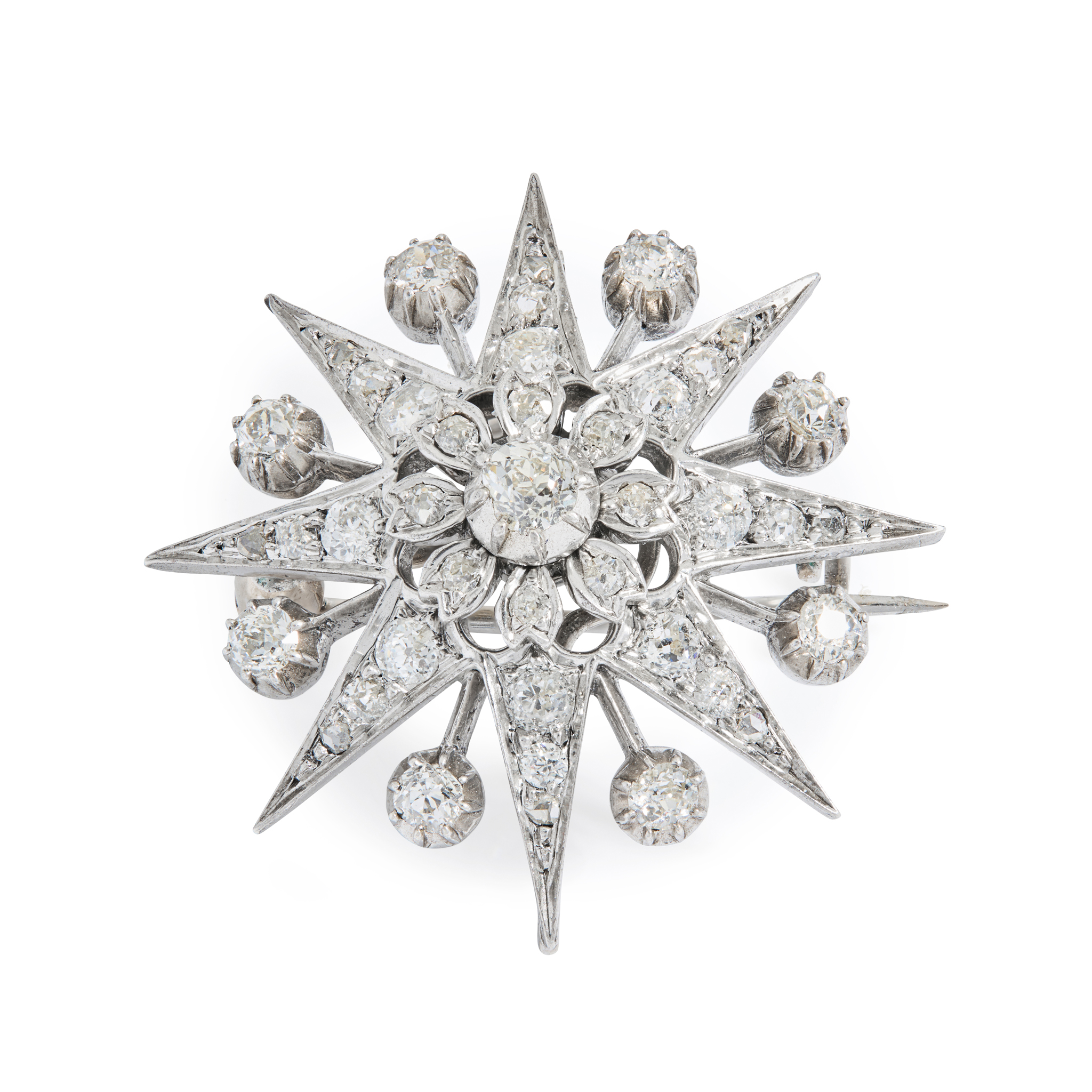 A diamond star brooch