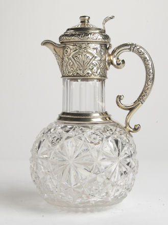 A Victorian silver mounted claret jug