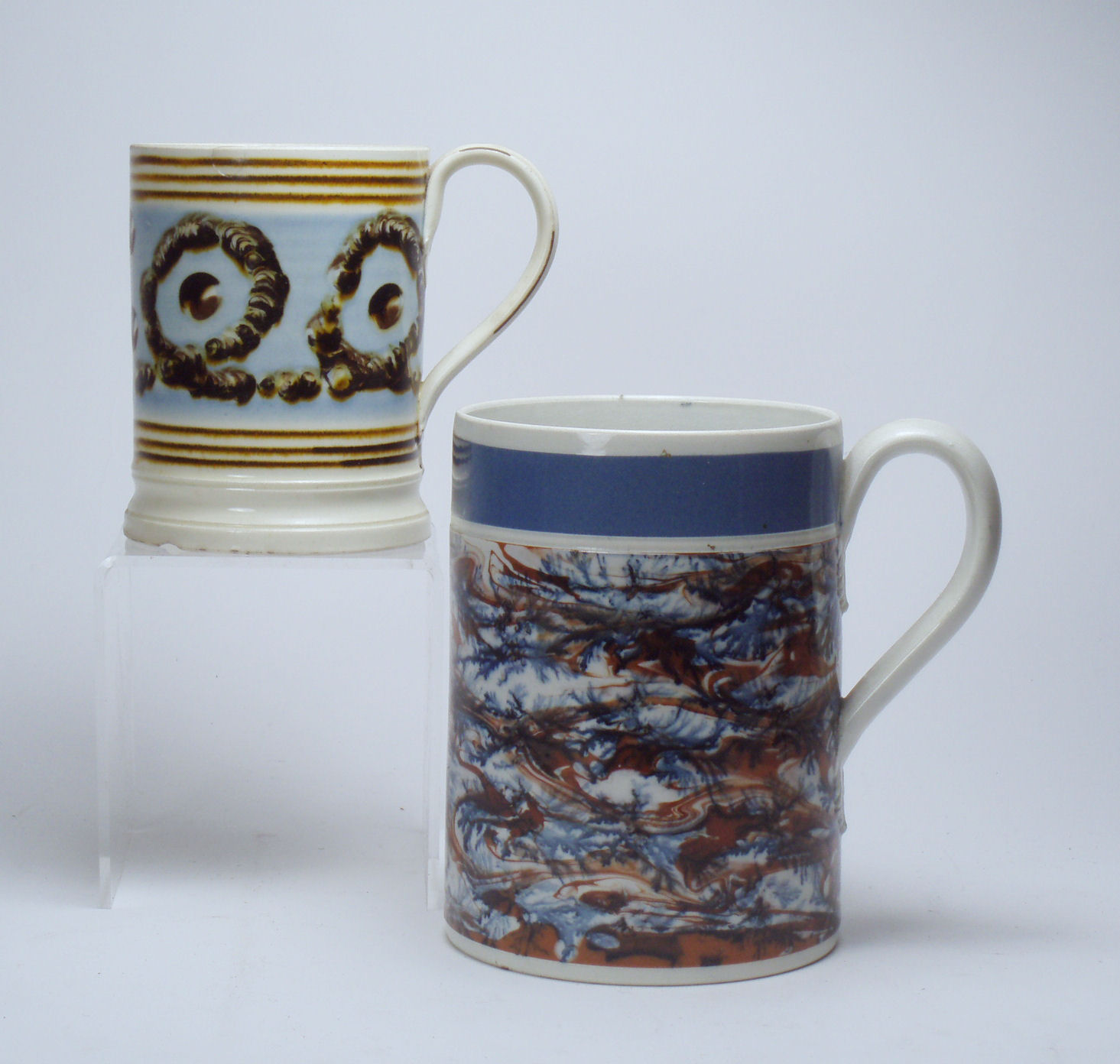 An early 19th century dipped ware pottery mug