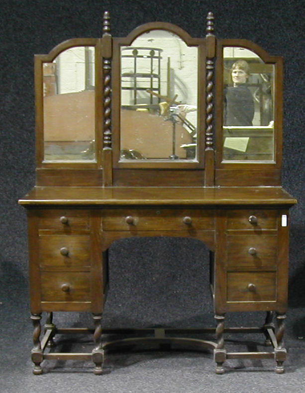 A 1920s mahogany bedroom suite,