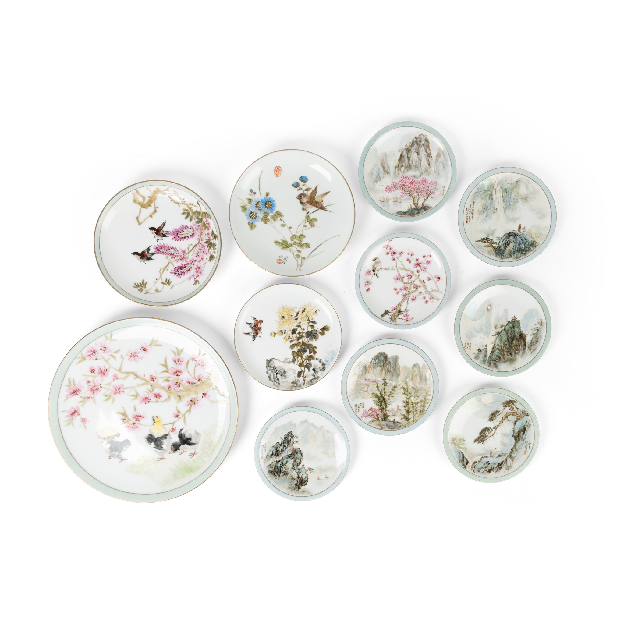 GROUP OF ELEVEN FAMILLE ROSE CIRCULAR PLATES