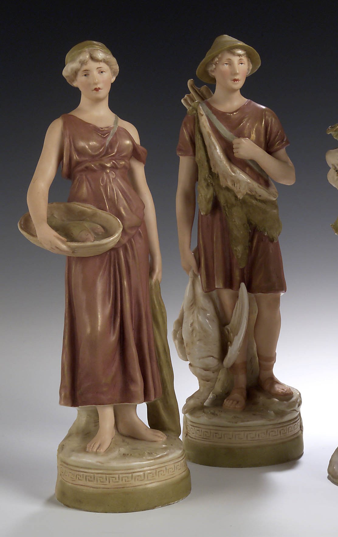 A pair of Royal Dux Art Nouveau figures