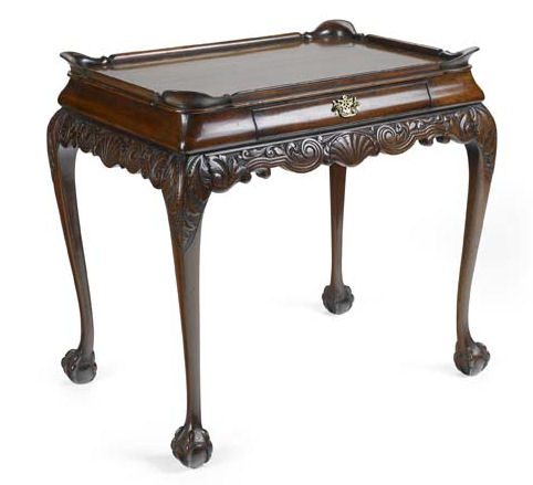 A mahogany silver table In the 18th century Dutch manner
