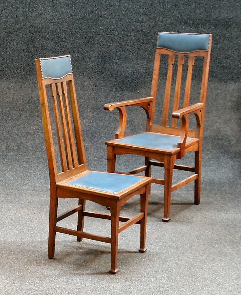 A set of six oak Arts and Crafts dining chairs Probably by Wylie & Lochhead of Glasgow