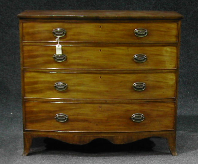 A large oak breakfront bookcase,