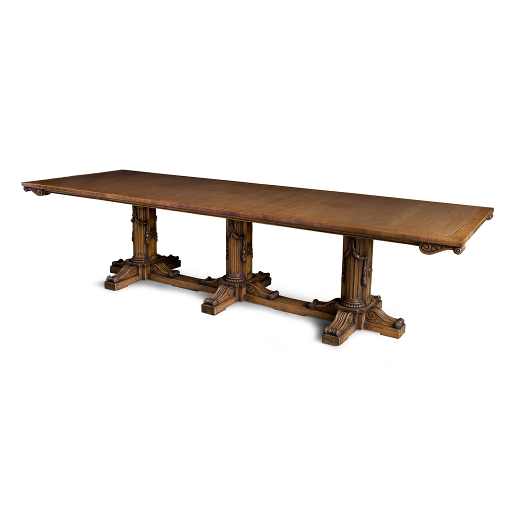 A GEORGE II STYLE PINE, BEECH, AND MAHOGANY INLAY CROSSBANDED TRIPLE PEDESTAL DINING TABLE, RETAILED BY CALLOWS OF MOUNT