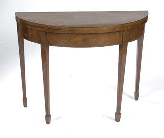 A George III period demi-lune mahogany card table