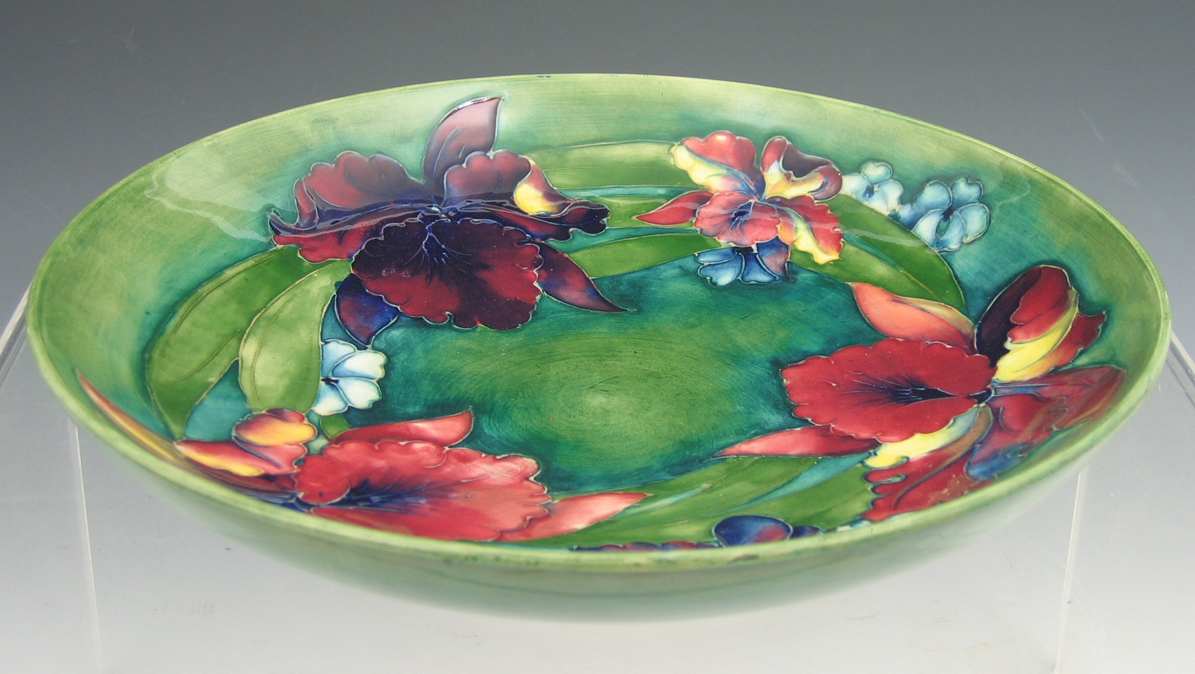 A Moorcroft circular charger,