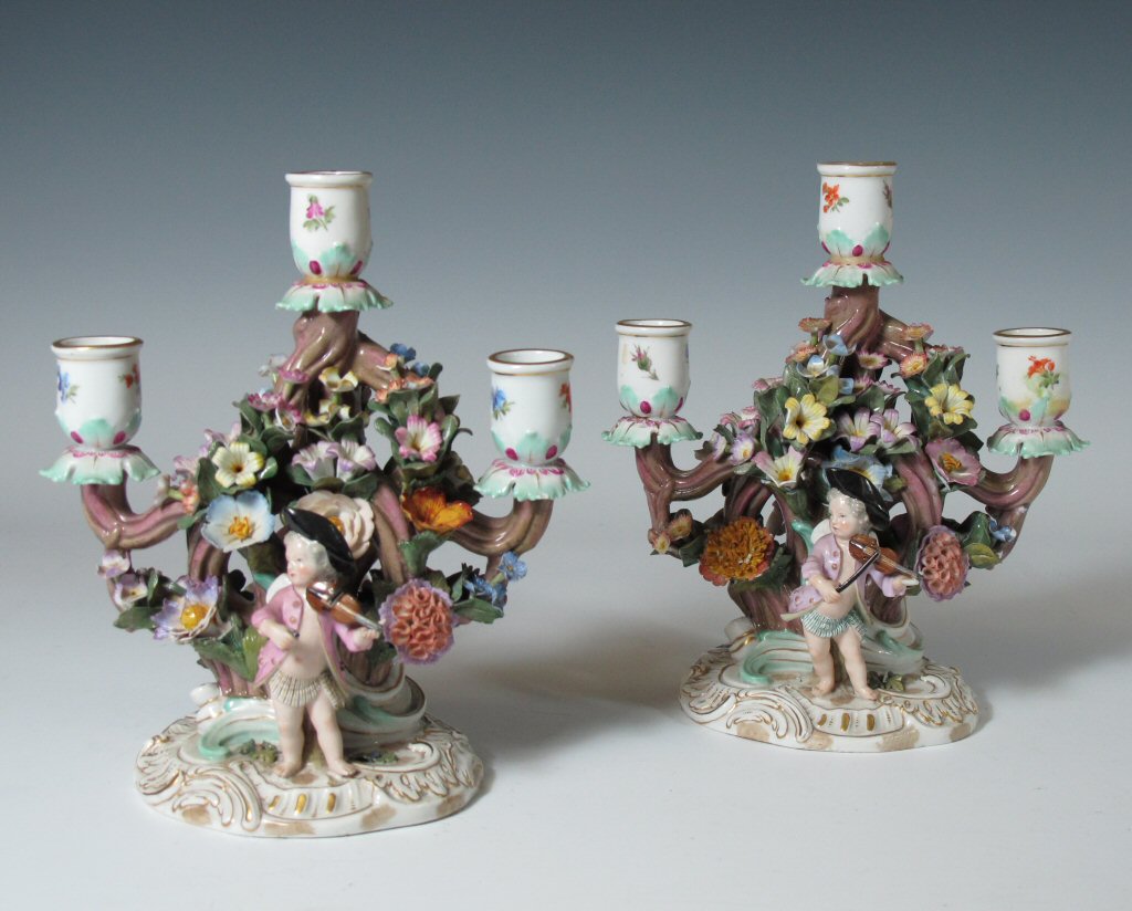 A pair of 19th century Meissen style three branch candelabra