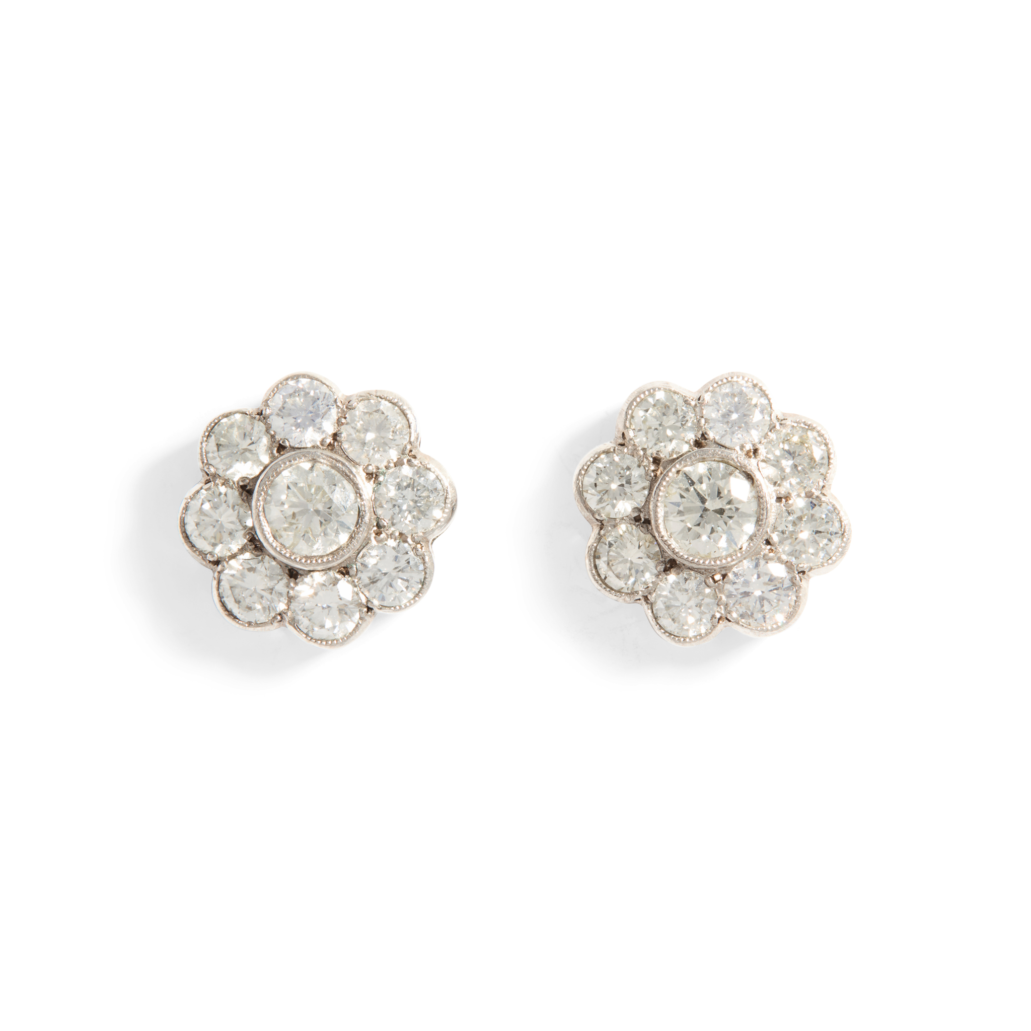 A pair of diamond cluster earrings