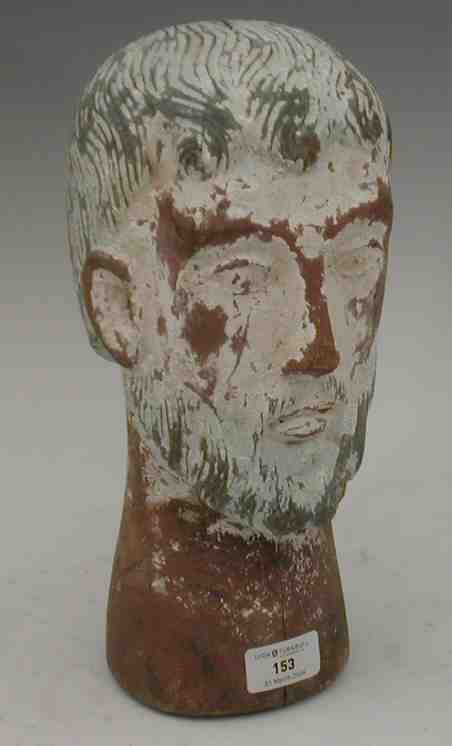 An 18th century Portugese Goan processional carved timber head of a saint,