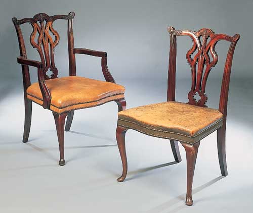 A set of eight Edwardian mahogany Chippendale style dining chairs