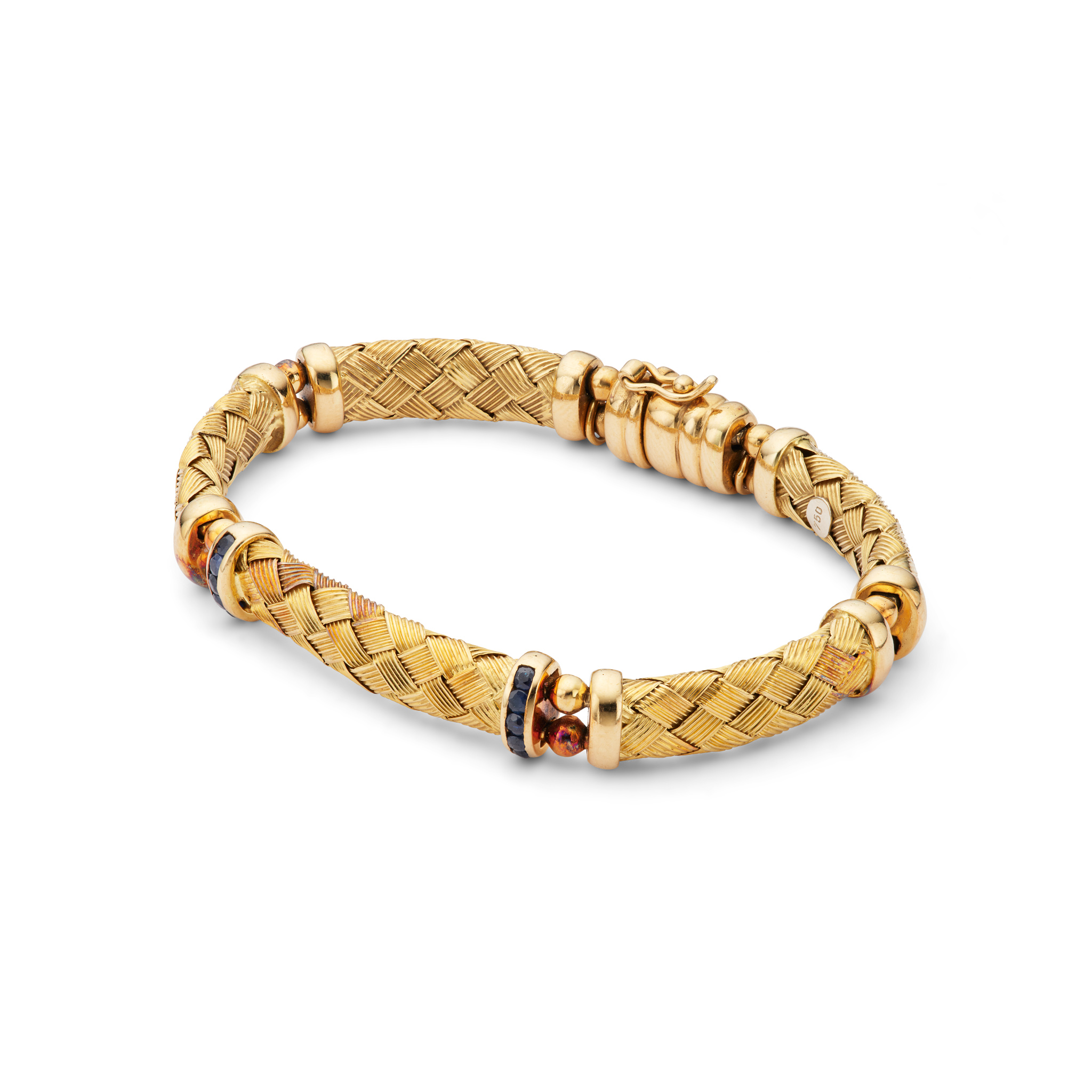 A gold and sapphire bracelet
