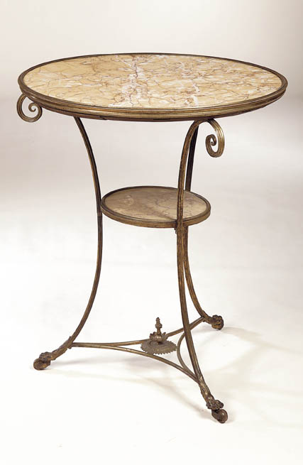 A gilt brass gueridon,