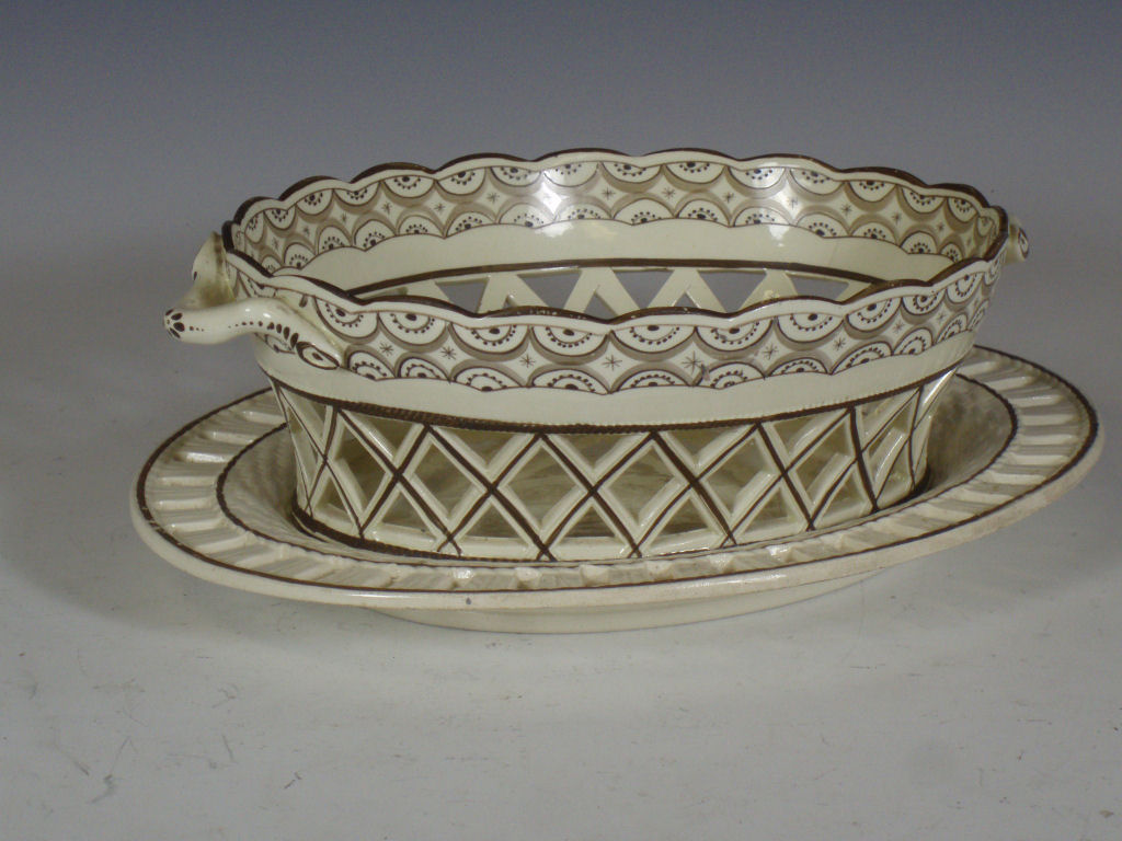 A 19th century creamware twin handled basket Possibly Leeds