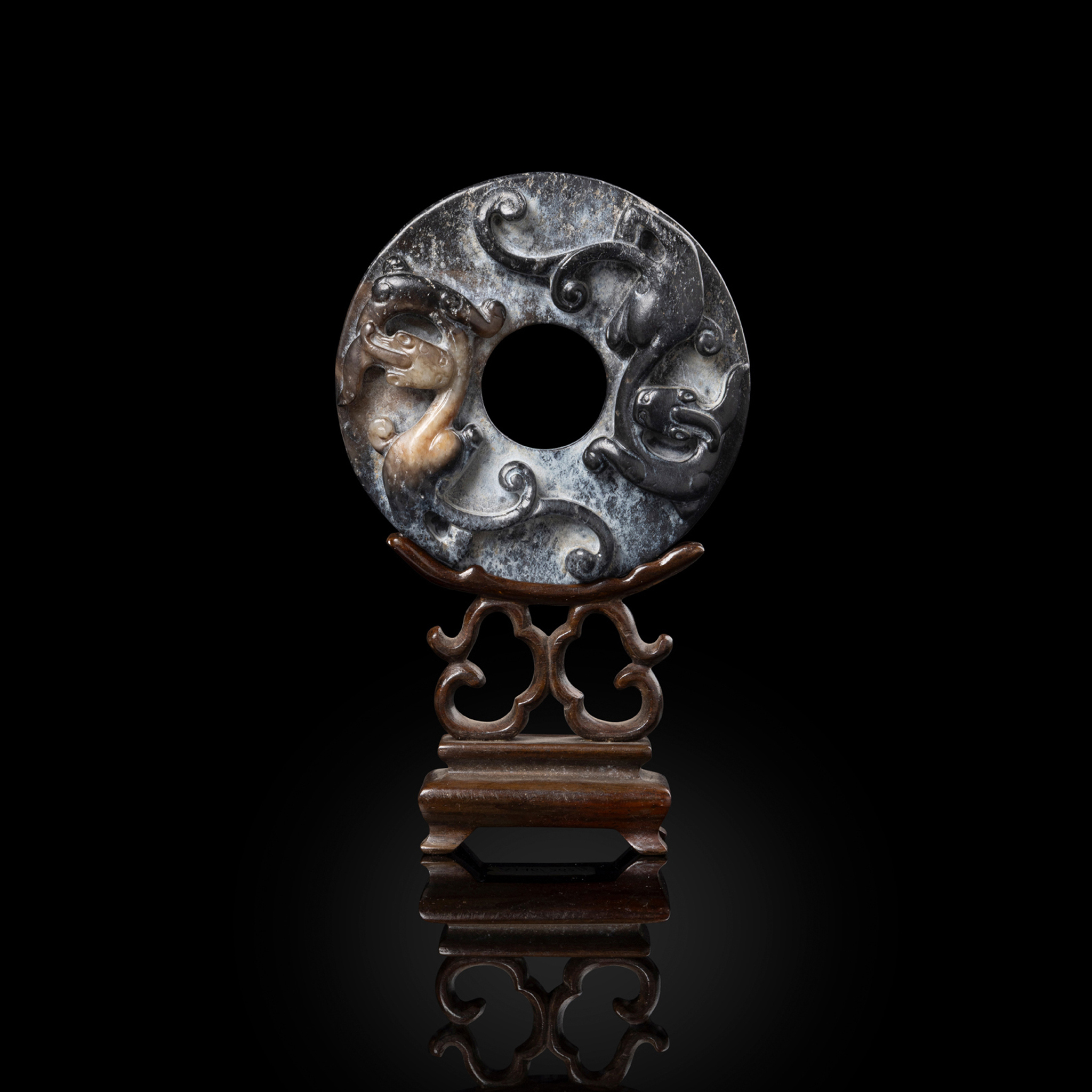 CHINESE PALE CELADON AND BLACK JADE 'CHI-DRAGON' DISC, BI
