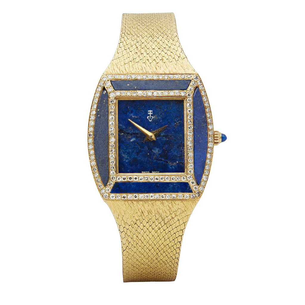 CORUM - A lady's 18ct gold diamond and lapis set wrist watch