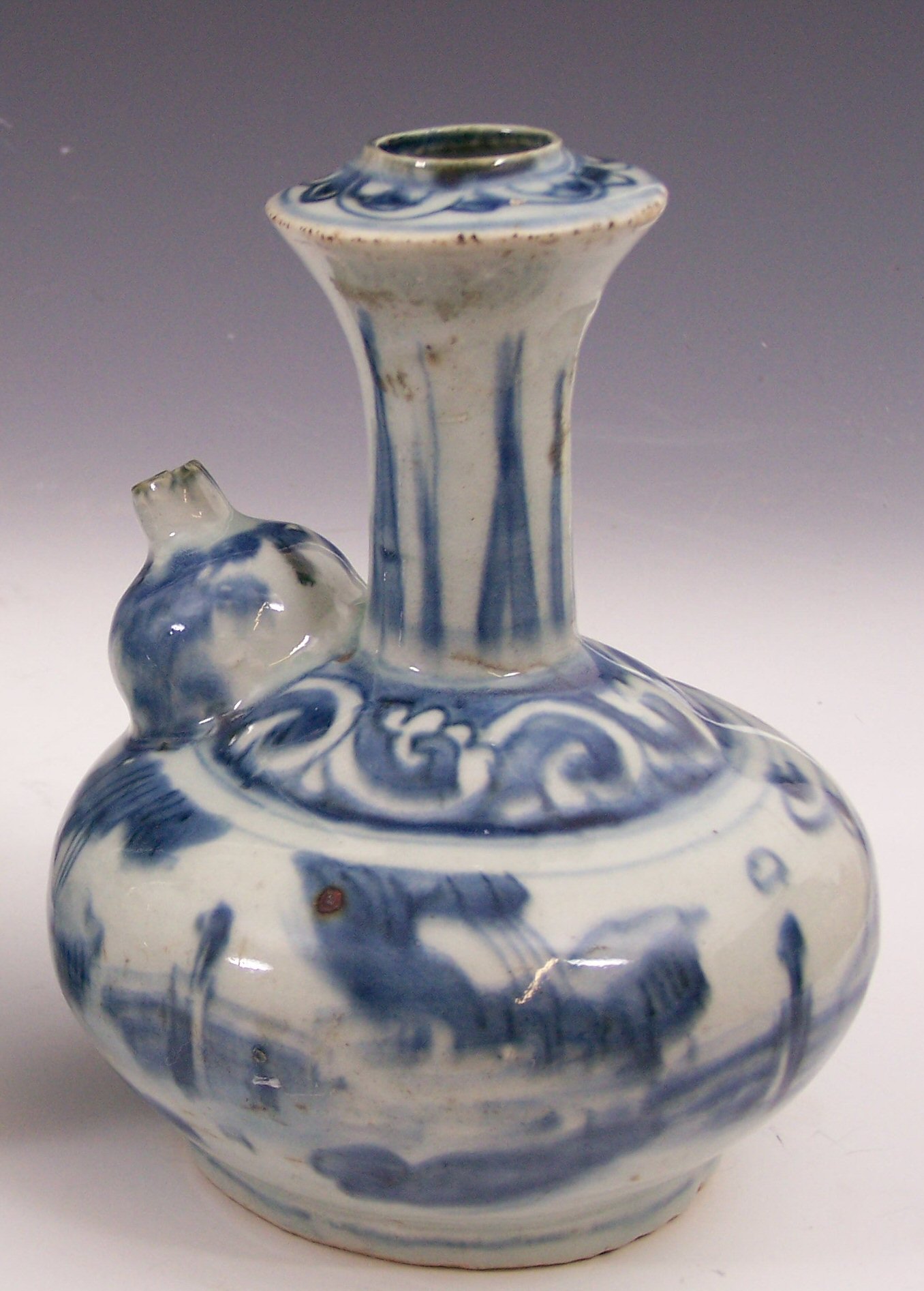 A Chinese blue painted kendi, 17th century,