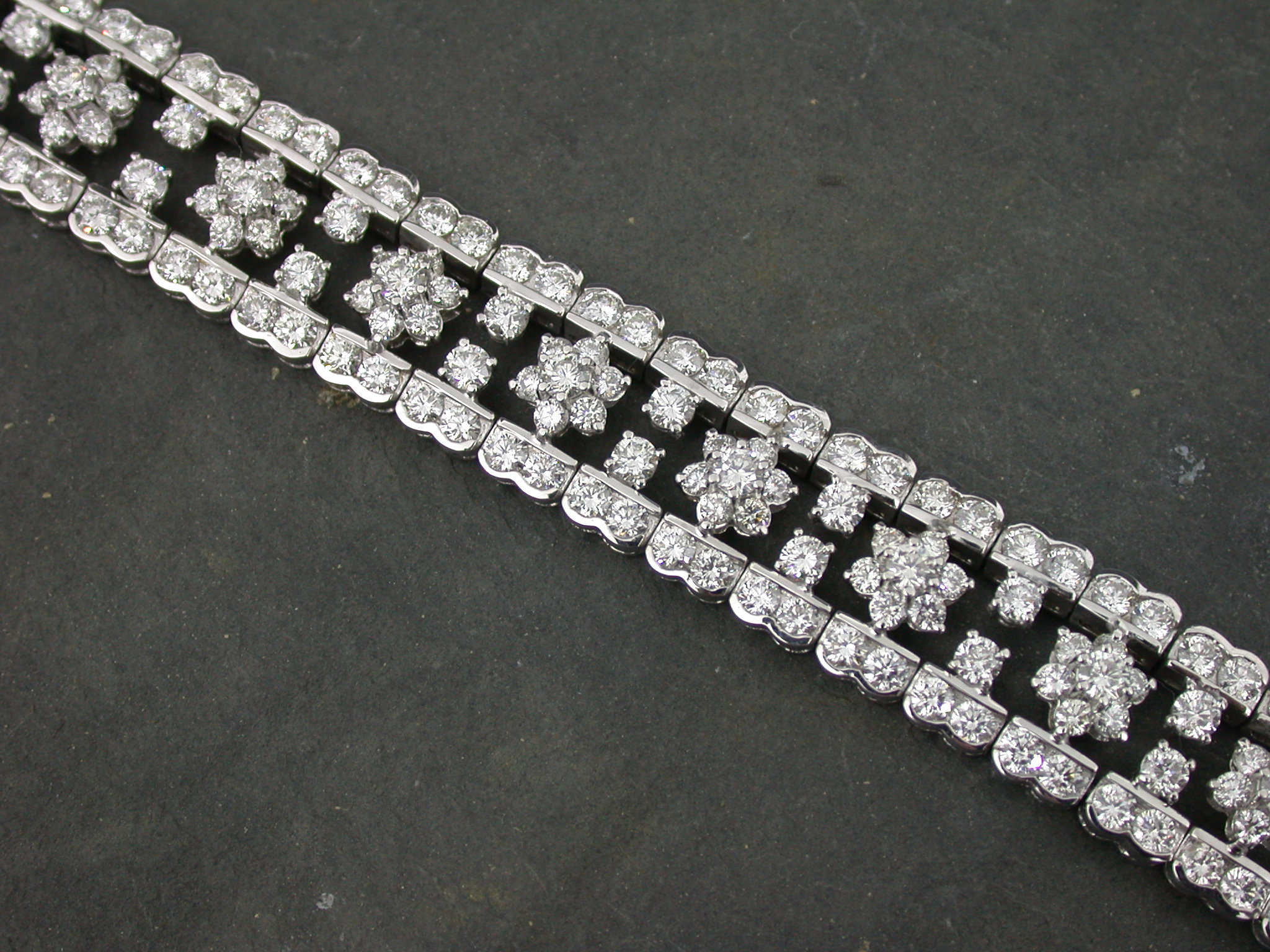 An 18ct white gold mounted brilliant cut diamond set bracelet,