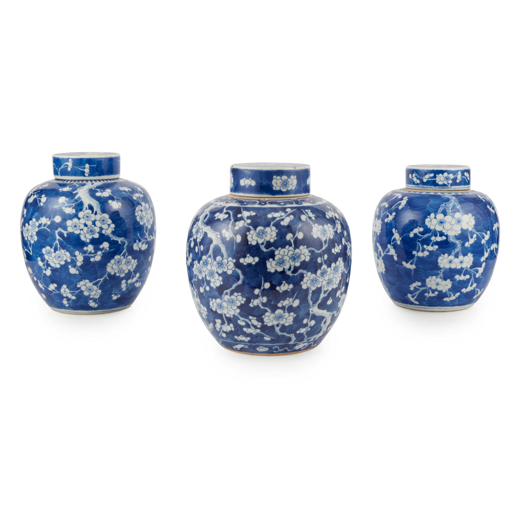 GROUP OF THREE BLUE AND WHITE GINGER JARS WITH COVERS