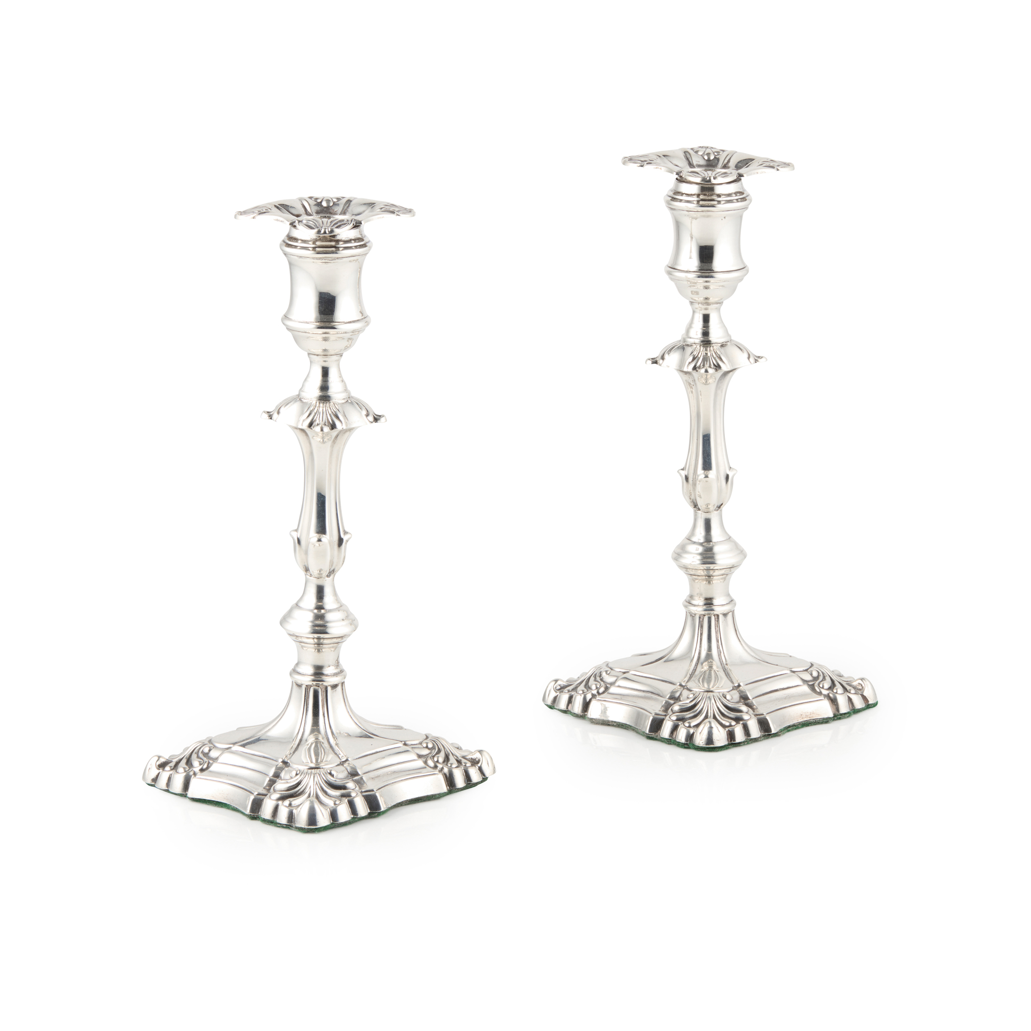 A PAIR OF GEORGE III STYLE MODERN CANDLESTICKS