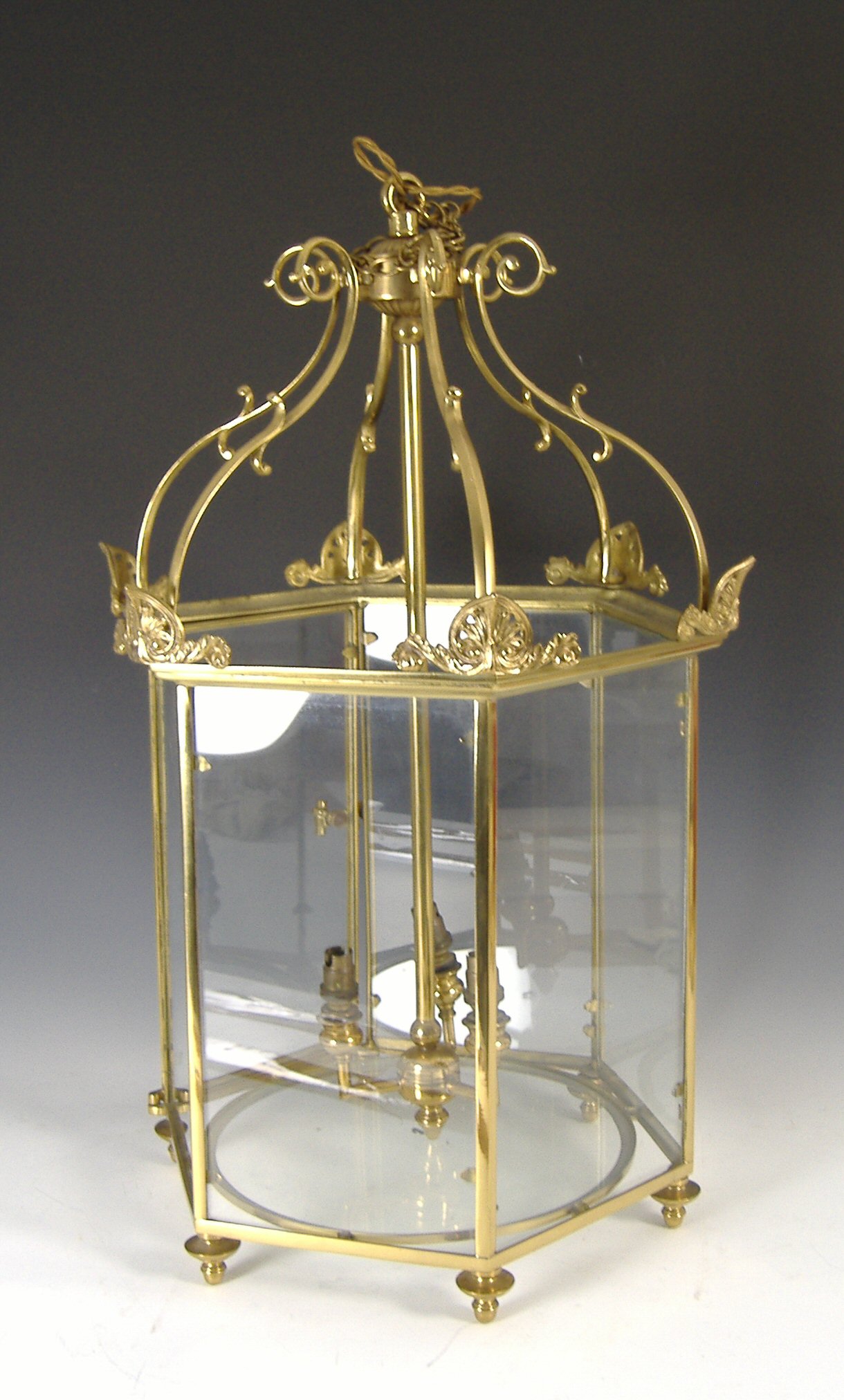 A pair of brass hall lanterns,