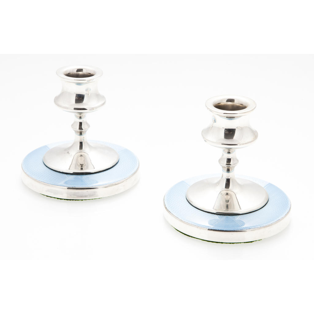 A pair of dressing table candlesticks