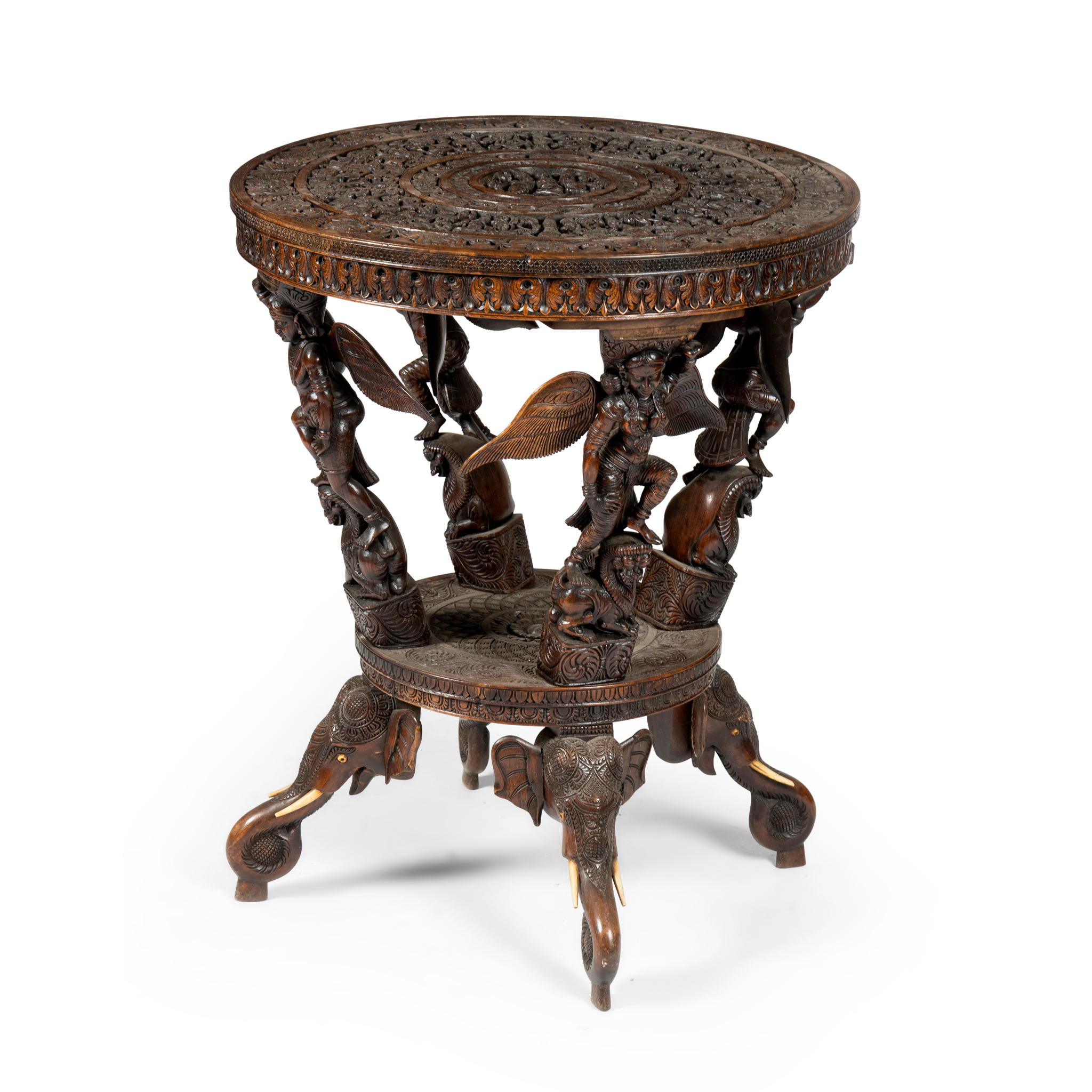 AN ANGLO INDIAN BURMESE CARVED HARDWOOD CENTRE TABLE