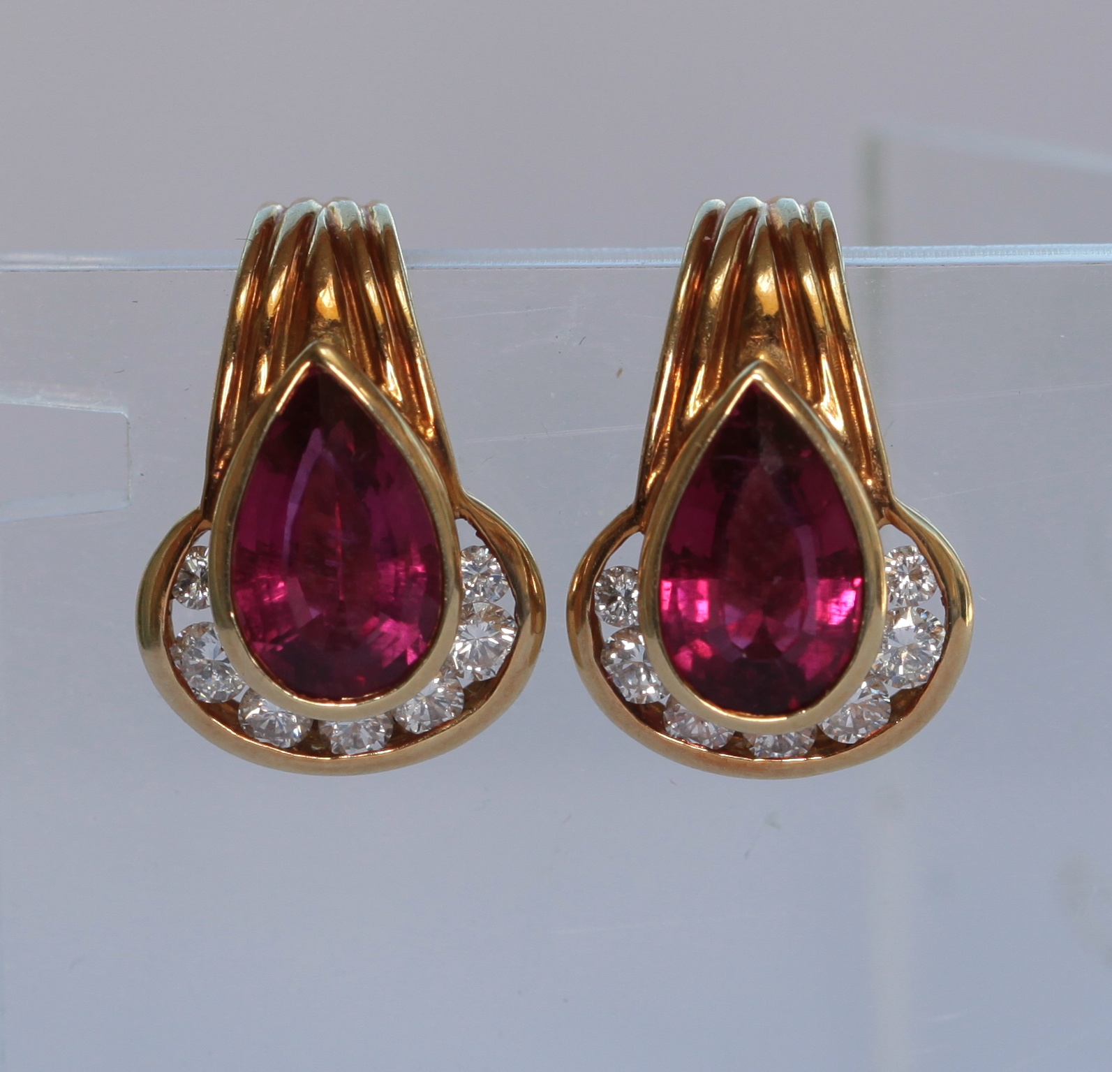 A pair of tourmaline and diamond set ear clips