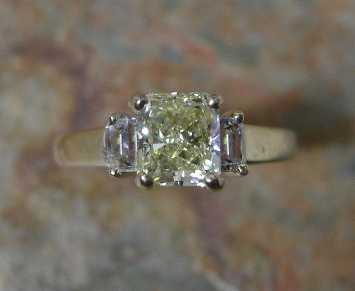 A diamond three-stone ring,