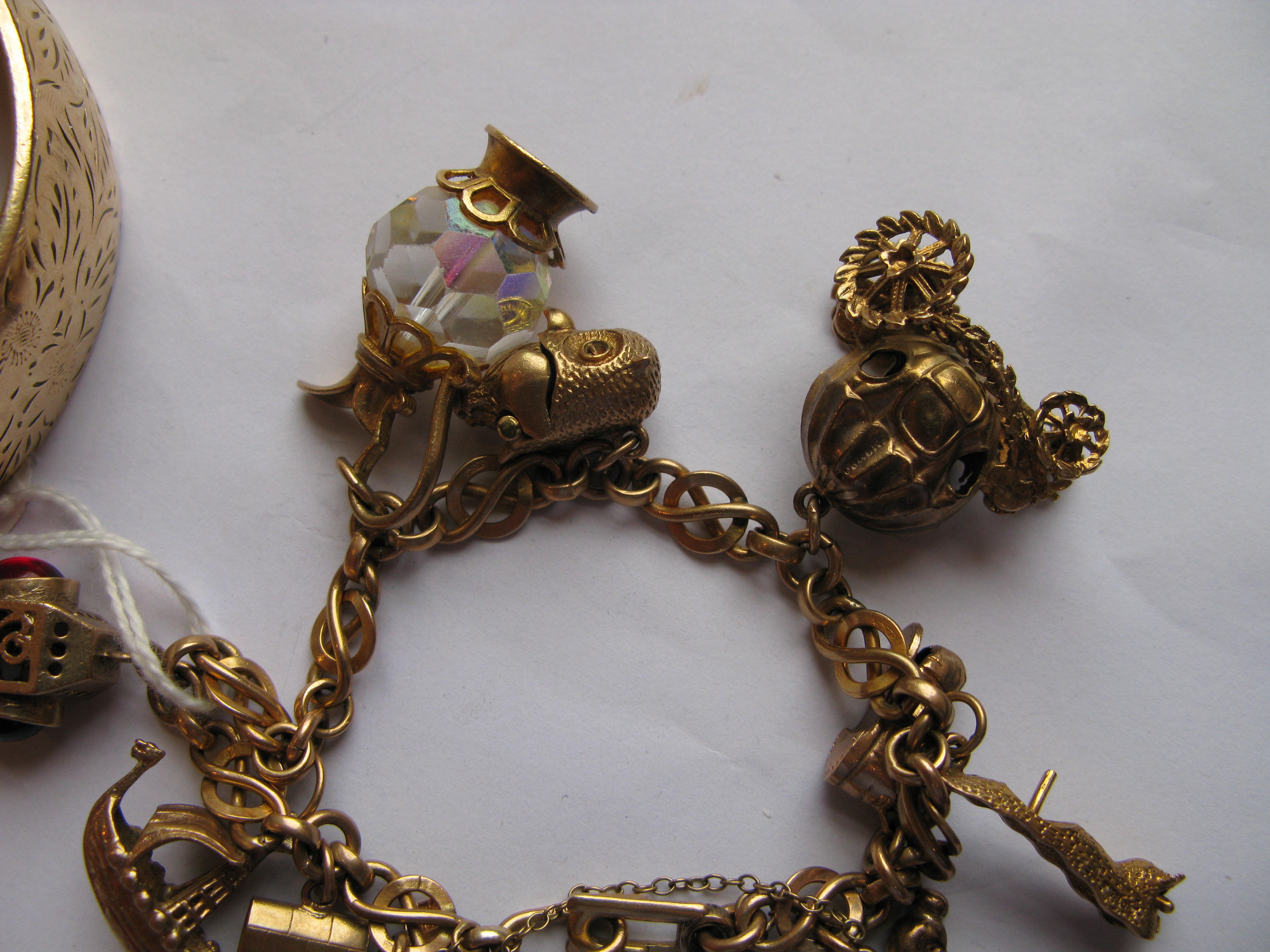 A 9ct gold charm bracelet